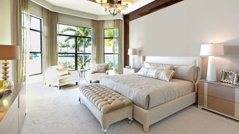 Bright modern bedroom with large windows, neutral tones, and creative bedroom accessories